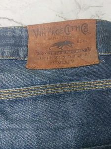Distressed Blue Denim Jeans