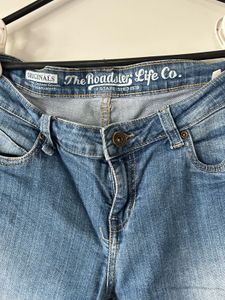 Women's Blue Distressed Jeans with Patch