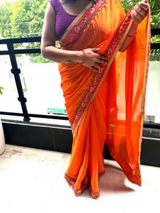 Vibrant Orange Embroidered Saree