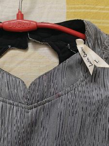 Stylish Grey Textured Sleeveless Blouse