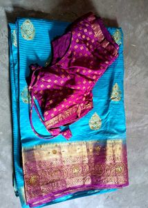 Beautiful sky Saree with rich border&ready Blouse