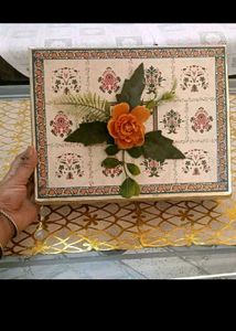 10. Decorative Gift Box with Floral Accent