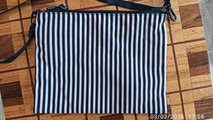 Chic Striped Sling Bag by Tommy Hilfiger