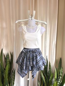 Imported Plaid Asymmetry Skort with Bow Detail