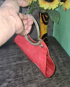 Elegant Coral Clutch Bag with Crystal Handle