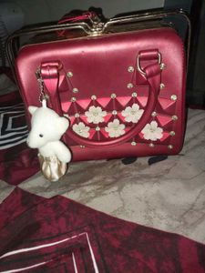 Chic red Handbag with Teddy Charm