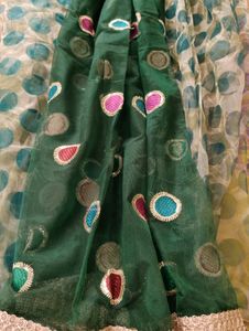Bottle Green Colour Netted Saree
