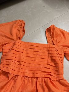 Orange Puff Sleeve Peplum Top