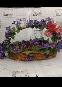 8. Wicker Basket with Purple Flowers