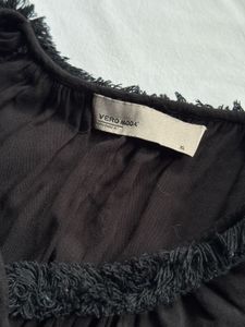 Oversized black tie front blouse