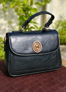 Chic Black Handbag with Embellished Detail