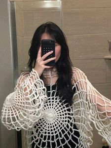 Spider-web crochet pullover
