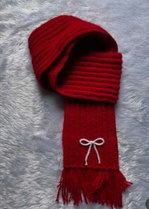 Red Knitted Scarf with Bow Detail