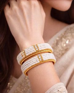 Sale | Pearl and Gold Bangle Set