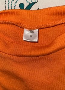 Orange Ribbed Backless Top