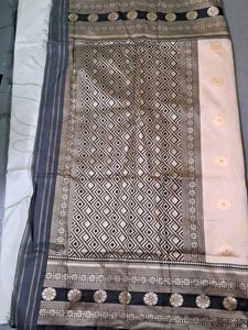 Elegant Beige Saree with Black Border