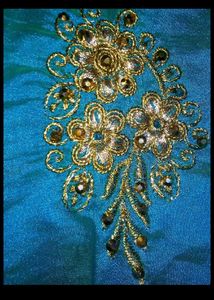 Stunning Teal Saree with Gold Embroidery