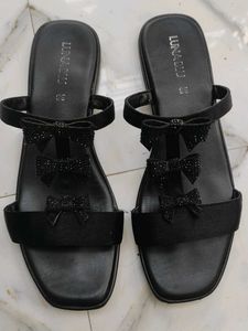 Westside Flat Bow Sandals.