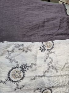 Embroidered fabric with solid matching fabri