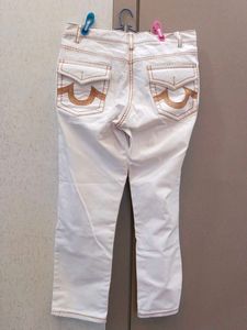 Stylish White Jeans with Brown Stitching