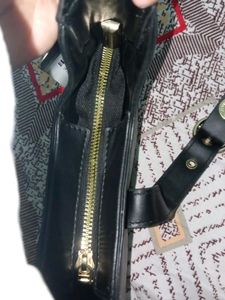 Chic Black Hobo Bag with Gold Accent