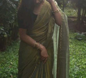 Green Tissue Silk Saree with Scallops border