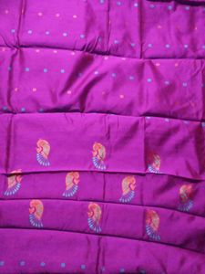 Vibrant Purple Silk Saree with Peacock Motif