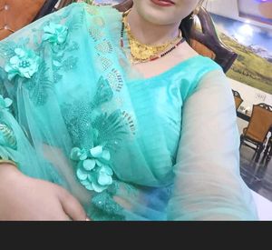 Beautiful Teal Net Saree with Floral Embellishment