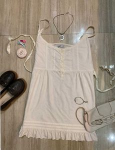 Cream Camisole with Ruffle Hem