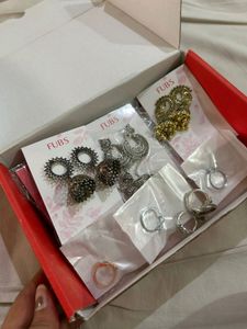 Set Of 14, 7 Rings And Earin