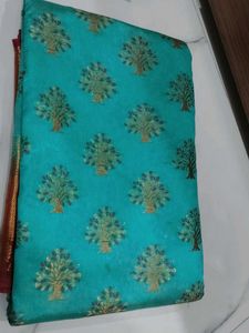 Beautiful Teal Saree with Gold Border