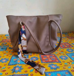 Stylish Tan Tote Bag with Scarf Accent