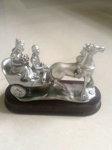 Cute Couple on chariot Statue