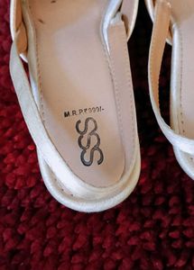 5. Elegant Embellished Slingback Heels
