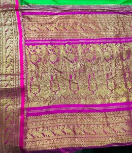 Vibrant Green Silk Saree with Pink Border