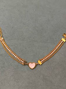 Elegant Gold Bracelet with Heart Charm