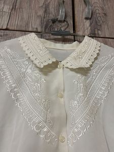 Elegant White Embroidered Blouse