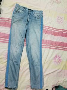 Light Wash Jeans with Blue Stripes
