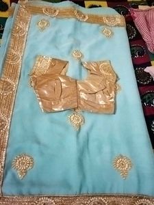 Stunning Blue Saree with Golden Embellishments