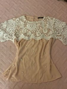 Lacy feminine peach top