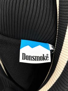 Black Varsity Jacket with Unique Graphics