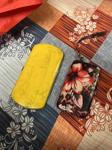2 Clutches And 1 Handbag