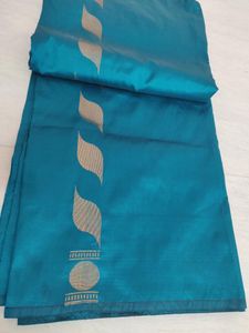 Elegant Teal Saree with Golden Border