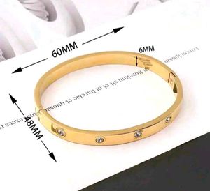 Elegant Gold Bangle with Diamonds