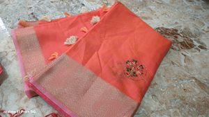 Elegant Orange Saree with Tassels