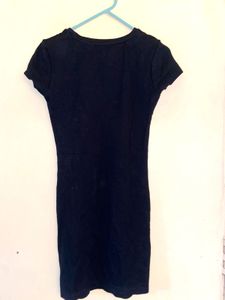 Stylish Black Mini Dress with Grommet Details