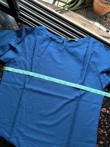 Blue top with cut work sleeves