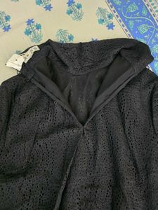 Elegant Black Textured Mock Neck Top