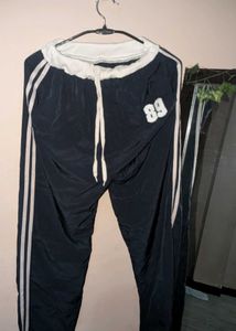 Blue Athletic Pants with White Stripes