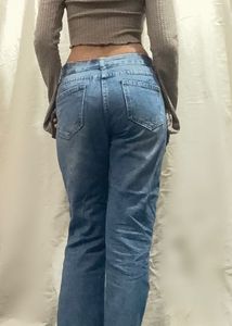Distressed Blue Denim Jeans